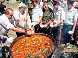 don cossacks in army uniform wait in line for borscht 2006