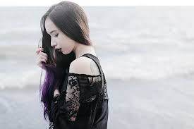 women outdoors purple hair black