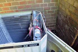 clean an outdoor air conditioning coil