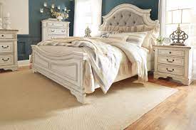 Prentice collection by ashley furniture bedroom if you're looking for something on the lighter side, look no further than the prentice collection by ashley signature design furniture. Realyn Queen Upholstered Panel Bed Ashley Furniture Homestore