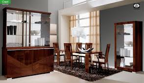 Mealtime should always be a pleasant and joyful event, which is why breaking bread with family and friends on a beautiful dining table transforms a meal into a very special experience. Capri Dining Room Set In Walnut Finish By Alf Group Italy