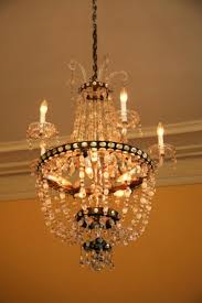 a chandelier from a concrete ceiling
