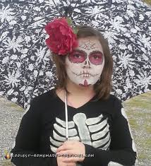 Paint a toothy grin in black across your mouth and cheeks, then paint the. 50 Coolest Homemade Dia De Los Muertos Costumes