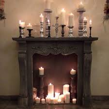 A Vintage Fireplace With Pillar Candles