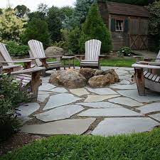 Outdoor features bring people together and can transform a simple backyard into a cozy, outdoor living space. Natural Flagstone Patio Fire Pit Natural Flagstone Patio Backyard Fire Patio With Fire Pit