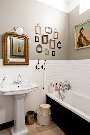bathroom décor with framed wall art
