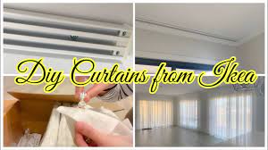 how to hang curtains from ceiling to