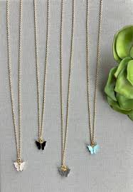 Use them individually for earrings, or punch a hole in each wing and attach three or more together for a delicate necklace on a chain. Dainty Butterfly Necklace 14k Gold Filled Butterfly Pendant Necklace Turquoise Butterfly Charm Minimalist Necklace Bridesmaid Gift Idea Aqua Diy Pendant Necklace Butterfly Pendant Necklace Pendant Necklace Simple