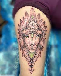 Tatouage lion cuisse femme by tattoosuzette on DeviantArt