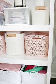 how i organized my hall closet in one