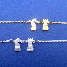 The second proposed mechanicsm eliminated the need of the long rook moves to the other side of the board. Knight And Rook Chess Piece Checkmate Charm Necklace In 2021 Charm Necklace Charm Necklace Silver Necklace