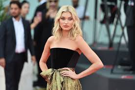 Photographed by david bellemere and styled by Elsa Hosk Scrambles For Dropped Earring At The Marriage Story 2019 Venice Film Festival Premiere
