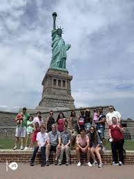 photo with the statue of liberty