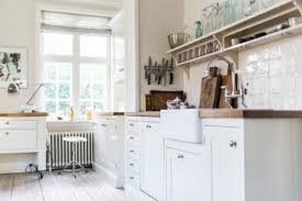 Prefab cabinets cost less but are not as nice.depending on the size and lay out it could cost you about 500.00 to 1000.00 unfinished. Getting The German Kitchen Look On A Budget Kitchen Magazine