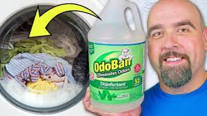 get mildew smell out of clothes with