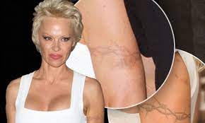 Pamela Andersons barbed wire tattoo is nearly invisible after laser removal  surgery | Daily Mail Online