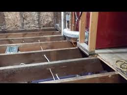 how to level floor joists in old home