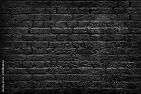 Old Black Brick Wall Background Stock