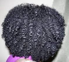 Her hair is long, straight and black. Important Information On Texlaxing Blackhairmedia Beautiful Curly Hair Natural Hair Styles New Hair Do