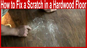 fix a scratch in a hardwood floor