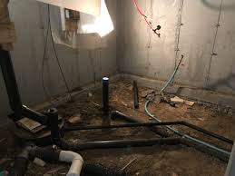 A Basement Bathroom With Rough In Plumbing