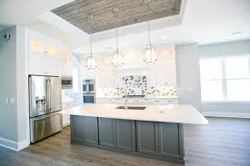 Combining two colours for the cabinets can instantaneously revitalize the entire kitchen, no matter the colours you choose, whether they are dynamic or dark colors. Top Design Trends Two Tone Kitchen Cabinets Wellborn Cabinet Blog