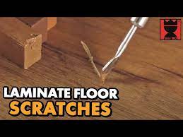 repair laminate floor scratches konig