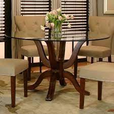 round glass dining table with wood base