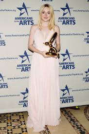 Her father was a former minor league baseball player and her mother a former tennis professional. Americans For The Arts Benefit 2013 Dakota Fanning Young Artist Award