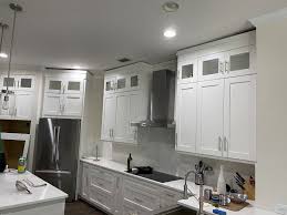 kitchen cabinets and uneven ceiling
