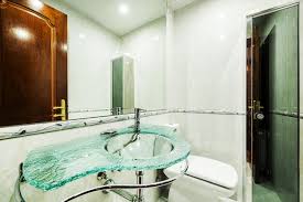 Bathroom With Clear Glass Sink