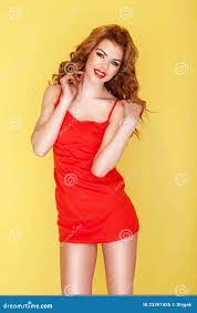 Beautiful Redhead in Red Miniskirt Stock Image - Image of sensual, pretty:  23397435
