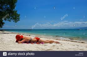 Image result for woman sunbathing