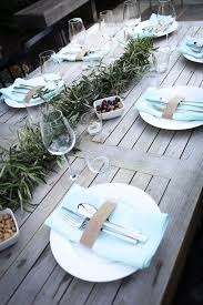 Decorate with metallic candles and small floral centerpieces. 15 Centerpiece Ideas For A Dinner Party On Love The Day