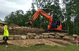 Building A Rock Wall And Levelling A