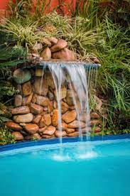Our stunning pool waterfalls are fabricated for user freindleness applications for your home's landscaping while adding its realistic beauty and being the superb choice. Add A Pool Fountain Or Waterfall For Extra Relaxation This Season Paradise Pools