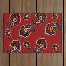 red paisley needle work textile pattern