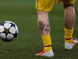 Crystals are portrayed just above the wearer's heels while an elaborate pattern creates a sleeve up the wearer's leg. When Did Messi Get His Tattoos Quora
