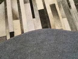 cowhide patchwork rug round gray
