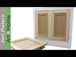 I made flat panel doors using plywood and ran into color problems, and that's one reason i tried the solid panel this time. How To Make Hang Flat Panel Cabinet Doors Youtube