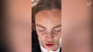 woman s freckle tattoo on face goes