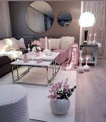 living room setup grey pink and white