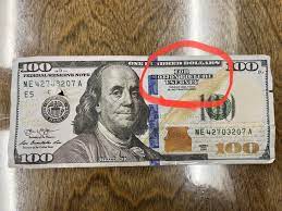 counterfeit 50 and 100 bills