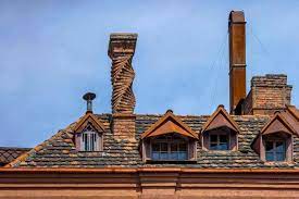 A chimney is a pipe through which smoke goes up into the air, usually through the roof of a building. What To Expect With An Historic Chimney Chimneys Com