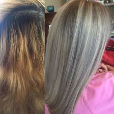An absolutely mesmerizing shade of ashy hair color made twice as dimensional thanks to the darker smokey lowlights throughout the hair length. From Grown Out Golden Blonde To Ash Blonde Hair Color Makeover Before After Platinum Blonde Pale Blonde Blonde Hair With Roots Dark Ash Blonde Blonde Roots