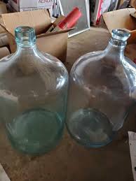 Although we offer our water in a wide range of containers, 5 gallon bottles remain one of the best options for homeowners and business owners because of the convenience these jugs provide. Lot 161a Pair Of Vintage 5 Gallon Glass Jug Water Bottles 1 Is Dated 1923