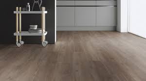 You can think of wpc flooring as luxury vinyl flooring amped up a notch with a special waterproof core that makes it perfect for just about any room in the house. Oak Canberra Grey Brown Rigid Core Waterproof Plank Wood4floors