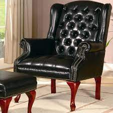 wing back tufted faux leather arm chair