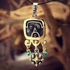 mayan venus jupiter talisman gold and