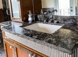 why do acids damage my stone countertop